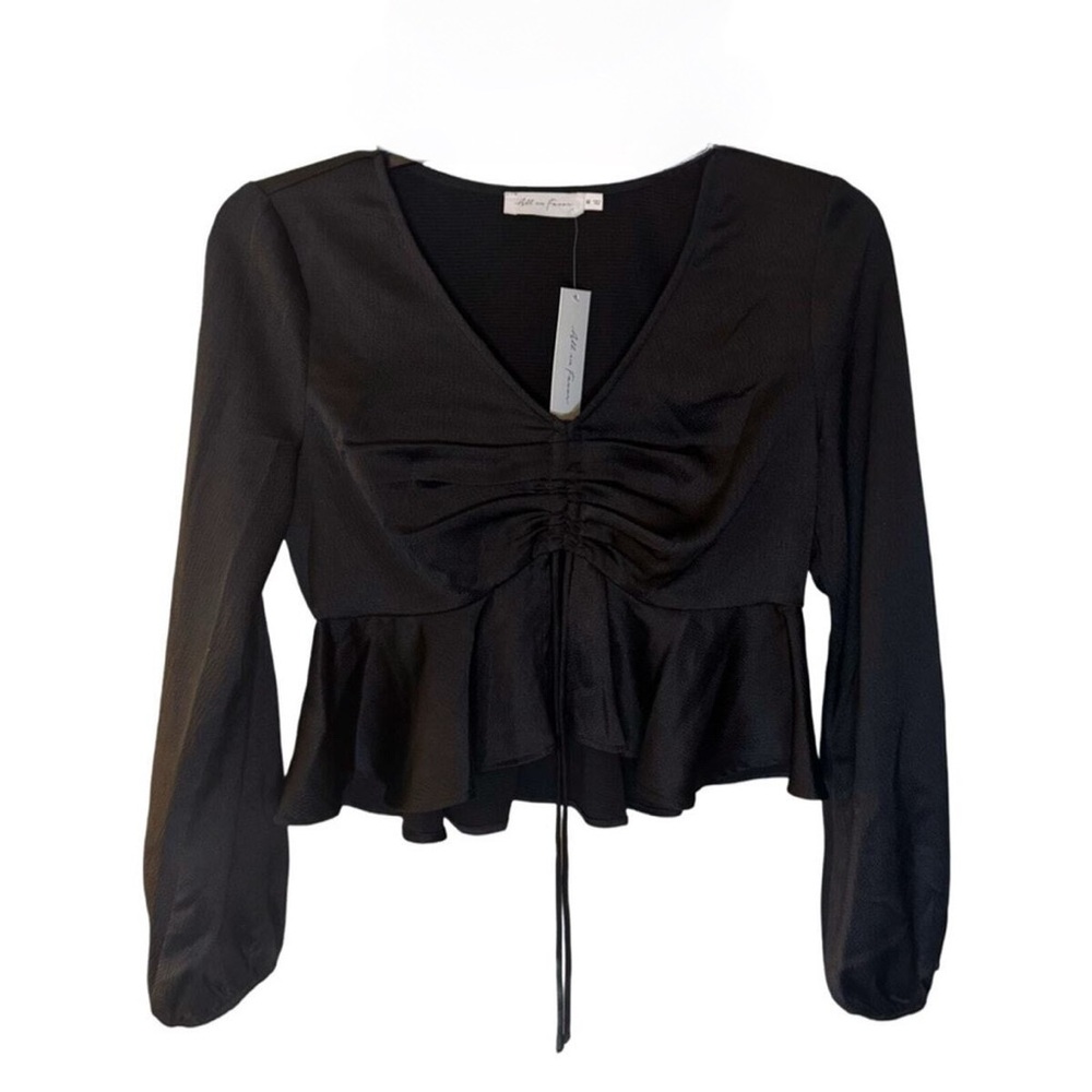 black "All in Favor Tie Front Satin Peplum Top" with a V-neck and long sleeves. - Picture 6 of 6